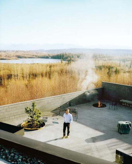 Alaska modern house deck with fire pit by Kamil Bialous