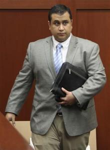 The Prosecution's Closing Arguments George Zimmerman leaves the courtroom after the state's closing arguments during his trial in Seminole circuit court in Sanford, Florida July 11, 2013. REUTERS-Gary W. Green-Pool