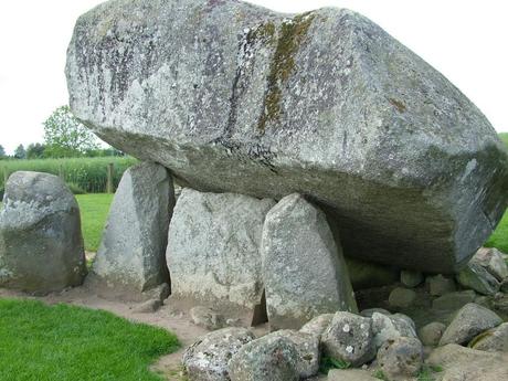 brownshill portal tomb - sideview of capstone held aloft by portal stones - county carlow - ireland