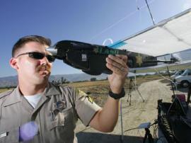 When the awful power of cop mustaches and surveillance drones unite, we all lose. 