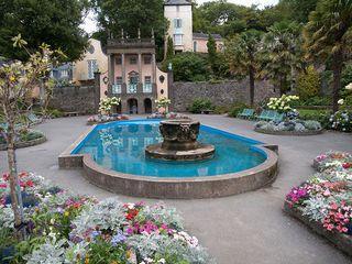 blue water fountain in stone garden, image copyright William Warby, flickr