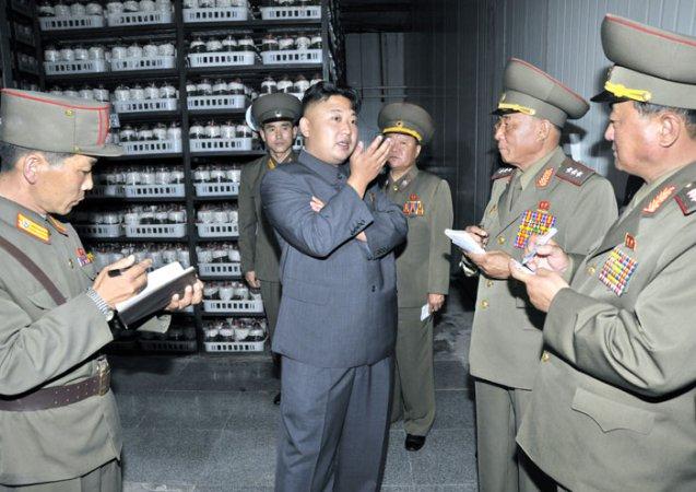 Kim Jong Un issues instructions to senior KPA officials and commanders of KPA Unit #534 during a tour of a mushroom farm recently constructed by the unit (Photo: Rodong Sinmun).