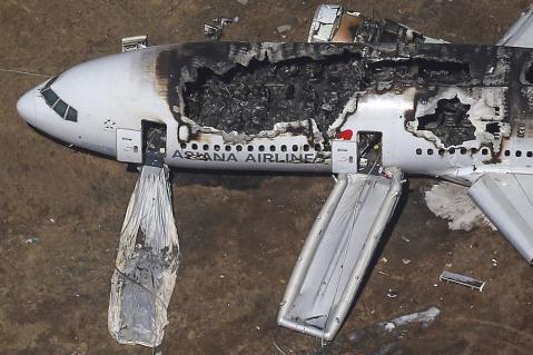 An aerial view of an Asiana Airlines Boeing 777 plane is seen after it crashed while landing at San Francisco International Airport in California