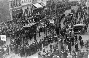 A crowd gathered in downtown Corvallis in celebration of Oregon Agricultural College's football victory over Michigan Agricultural College.  The final score was 20-0.  1915.