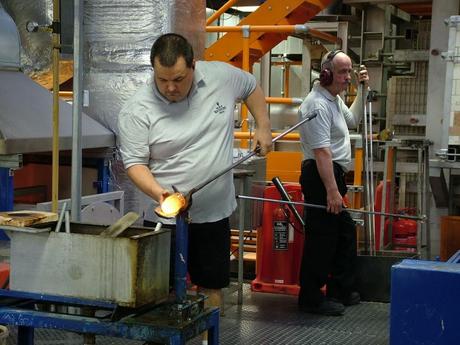 glass blower forming molten glass - house of waterford crystal - waterford - ireland