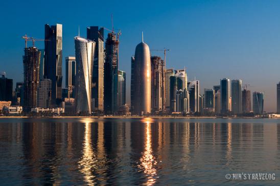 Around two hours after the sun rises, the reflection of the sun still very interesting against Doha's skyscrapers. 