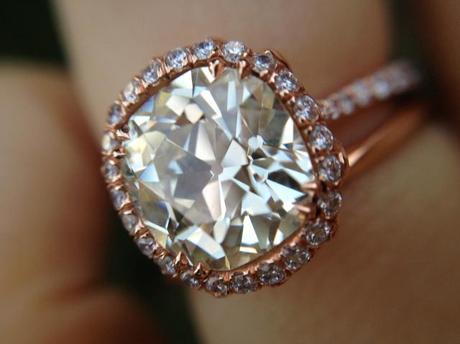 Custom diamond halo engagement ring in rose gold Custom diamond halo engagement ring in rose gold