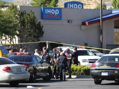 Image: Emergency personnel respond to a shooting at an IHOP restaurant