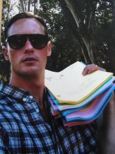 Alexander Skarsgard with signed True Blood script