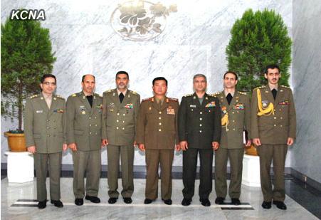 Minister of the People's Armed Forces, Col. Gen. Jang Jong Nam (C) poses for a commemorative photograph with an Iranian military delegation in Pyongyang on 25 July 2013 (Photo: KCNA)