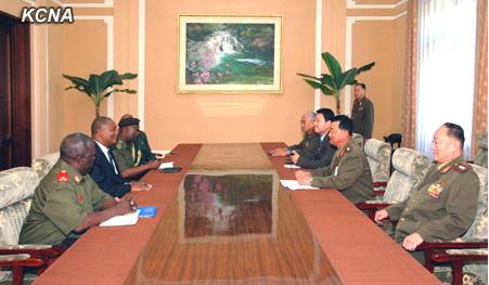 Col. Gen. Jang Jong Nam and senior Korean People's Army officials (R) meet with Agostinho Salvador Mondlane and a delegation of the Armed Forces for the Defense of Mozambique (L) in Pyongyang on 25 July 2013 (Photo: KCNA).