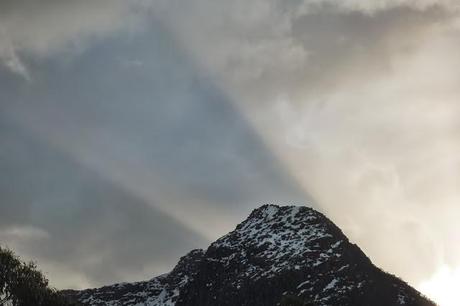 sun behind mountain overland track