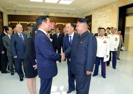 Kim Jong Un (R) shakes hands with Chinese Vice President Li Yuanchao (L) during an event for foreign government and political party delegations in Pyongyang on 27 July 2013 (Photo: Rodong Sinmun).