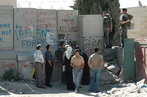 A military checkpoint along the route of the f...