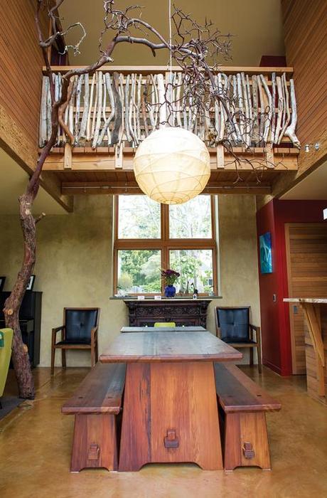 Modern dining area with reclaimed wood furniture 