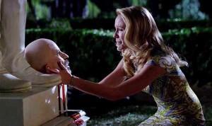 Sarah Newlin (Anna Camp) talks to a beheaded Governor Burrell (Arliss Howard) in HBO's True Blood Season 6 Episode 7, entitled 'In the Evening'