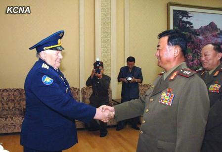 Minister of the People's Armed Forces Col. Gen. Jang Jong Nam (R) shakes hands with Korean War Veterans Council of Russia Vice Chairman Ya. V. Kanov (L) in Pyongyang on 30 July 2013 (Photo: KCNA).