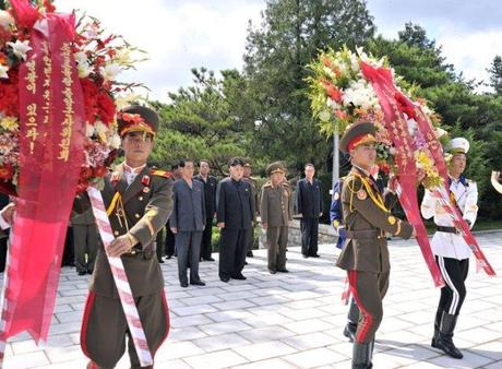 A Korean People's Army honor guard delivers floral wreaths to a monument in the CPV Martyrs' Cemetery in Hoech'ang County, South P'yo'ngan Province on 29 July 2013 (Photo: Rodong Sinmun).