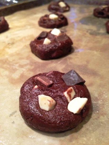 recipe and method for quadruple chocolate cookies rounding into balls and pressing chunks into top before cooking