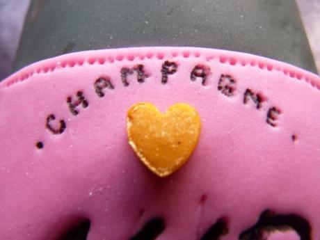 champagne tiny writing on pink fondant edible ink personalised champagne bottle wedding cake gold heart