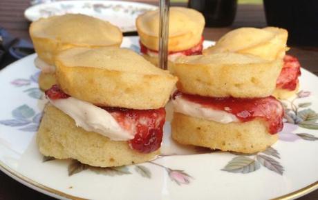 mini victoria sponge sandwiches perfect for afternoon tea cake stand oozing with jam and buttercream