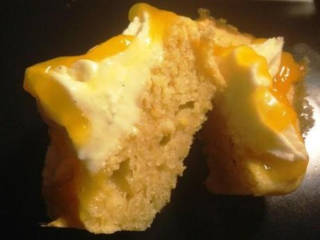 inside cut open cupcake mango recipe vanilla buttercream and mango coulis moist spong cake