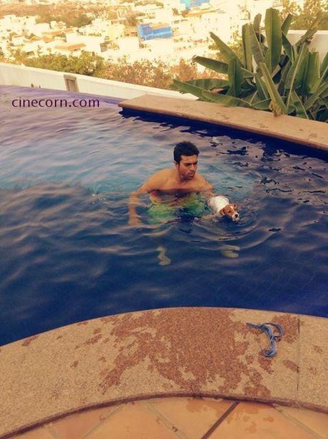 ram charan at home swimming with brat pics images galleries Ram Charan Swimming With Brat  A Cool Photo