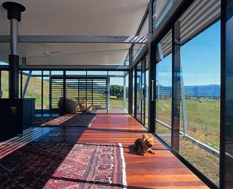 floor-to-ceiling window wood floor living room view pasture outside