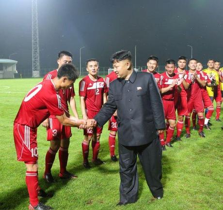 Kim Jong Un congratulates members of the Hwaebul Team after their victory over the 25 April Team (Photo: Rodong Sinmun).
