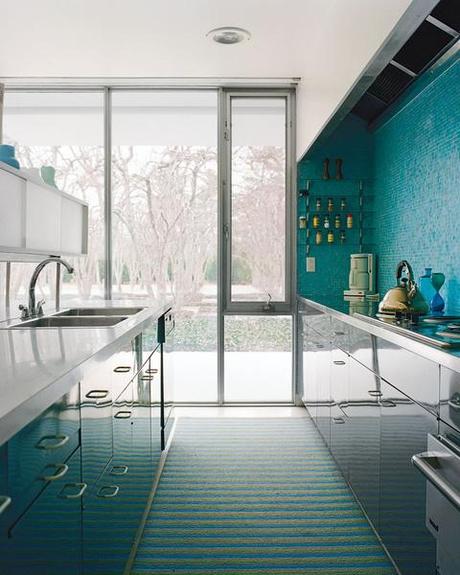 Miller House kitchen with a turquoise blue mosaic tile wall