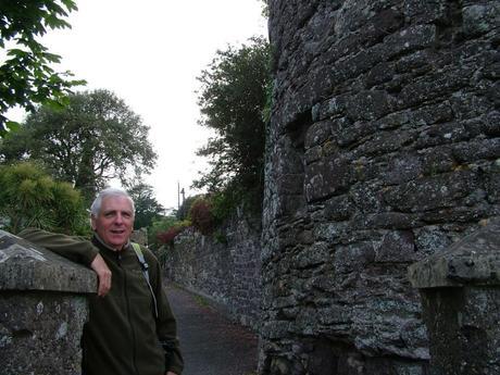 bob stands along a stone laneway in dunmore east in county waterford - ireland