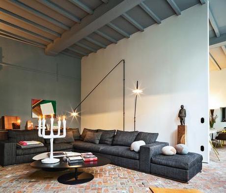 Modern living room with Flexform sofa and Jens Fager candelabra