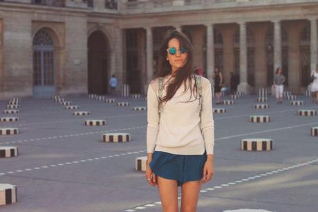 tennis inspired street style look wearing converse and tennis shorts