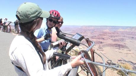 Jean listens to condor sounds at hopi point - grand canyon
