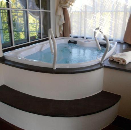 Private jacuzzi in our spa suite at Hotel Gut Ising Chiemsee, Germany