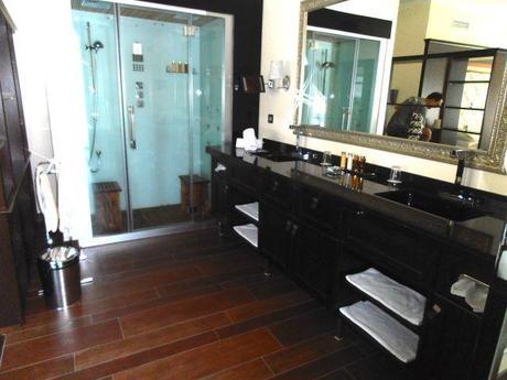 Bathroom with double sinks and shower for two in our spa suite at Hotel Gut Ising