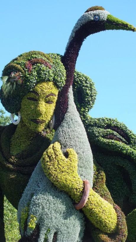 A true story ( woman holds a bird) - Mosaiculture - Montreal Botancial Gardens