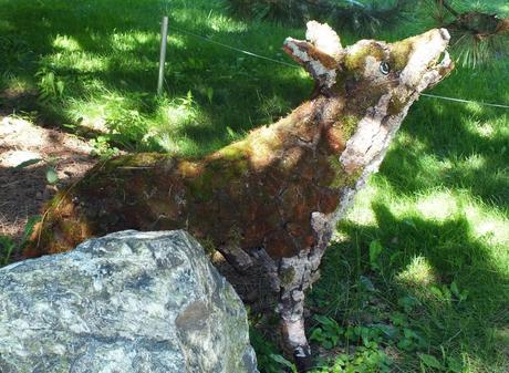 Wolf created out of wood at Montreal Botanical Gardens - Frame To Frame Bob & Jean