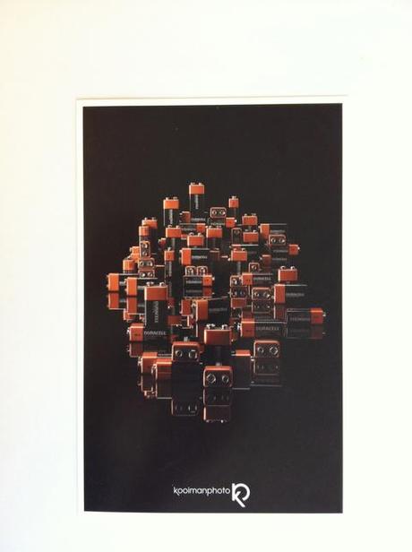 Front of the promo card of Paul Kooiman's latest photography promotional. batteries conceptual sculpture science