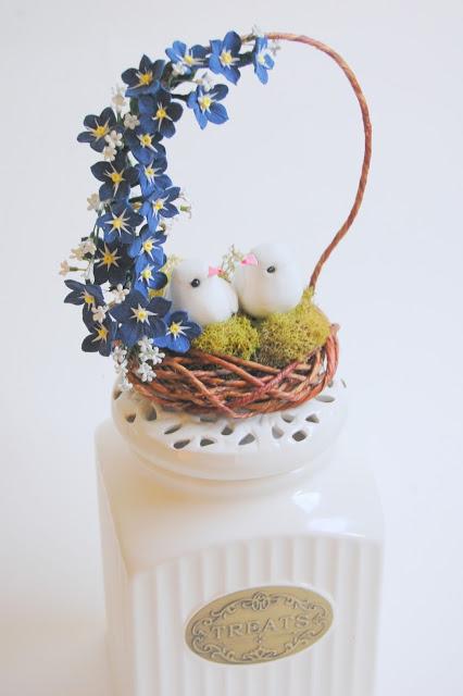navy blue birds nest cake topper and navy blue paper anemone