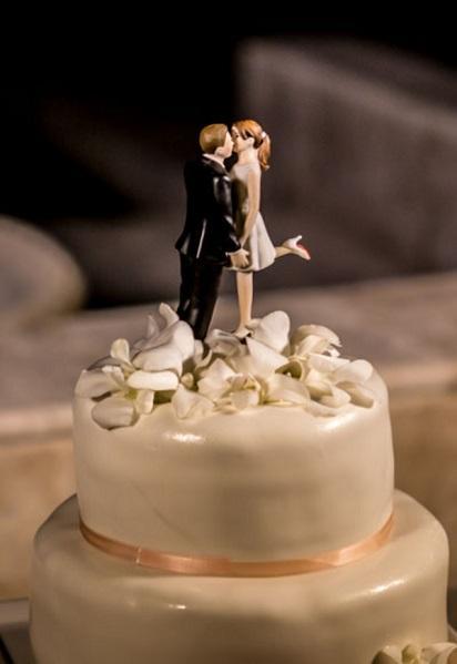 We love this adorable, unique cake topper! Destination Wedding: Antigua