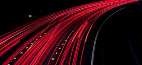 An electric road will consist of a large number of electrically conductive tapes—like the light trails on a night road. (Credit: Flickr @ Michael Rammell http://www.flickr.com/photos/mikerammell/)