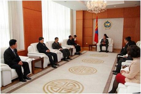 Mongolian President Tsakhiagiin Elbegdorj (background C) and Mongolian government officials (R) meet with Minister of People's Security Gen. Choe Pu Il and a DPRK delegation (L) in Ulan Bator on 28 August 2013 (Photo: Office of the President of Mongolia).