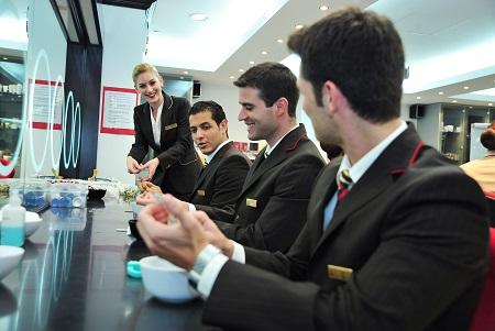 Longhaired flight attendant wins job back  Stuffconz