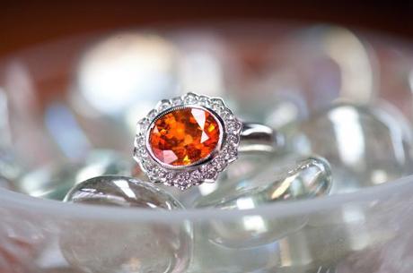 Custom engagement ring with spessartite garnet