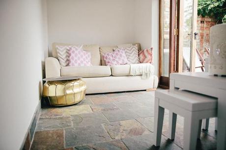 Sofa with Moroccan Pouffe and ikat cushion