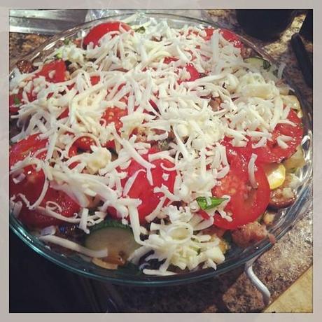 Pre-baked zucchini tomato casserole with ricotta, fresh herbs,...