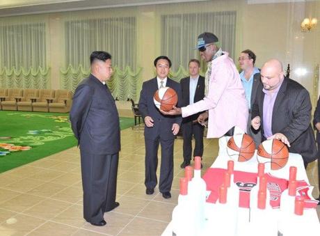 Dennis Rodman presents a basketball to Kim Jong Un (Photo: Rodong Sinmun).