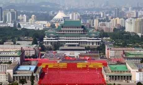 View of the Grand People's Study House overlooking Kim Il Sung Square in Pyongyang on 9 September 2013 during a parade and demonstration marking the 65th anniversary of the country's foundation.  Also viewable in this image behind the study house are the KWP Organization Guidance Department, the Pyongyang Ice Rink and the Red Wall Apartments (inhabited by KWP Secretaries) (Photo: Rodong Sinmun).