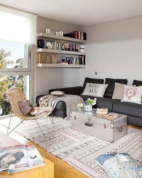 I really like the bookshelf over the part of the couch with no back! classy living room for a small space